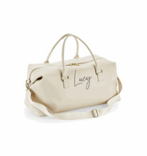 Load image into Gallery viewer, Oyster colour saffino grain fabric with high shine gold finishings. Finished with any fist name of your choice.