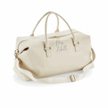 Load image into Gallery viewer, Large weekend bag made from saffino leather look fabric and high shine zips and buckles. Finished with the newly married surname of your choice.