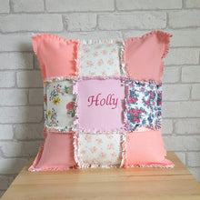 Load image into Gallery viewer, 16" square pacthwork cushion made from your baby's special clothing. Ragged edges around each square and edge of cushion.