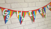 Load image into Gallery viewer, Rainbow colours striped cotton bunting flags with large white felt alphabet letters in capital and lower case.