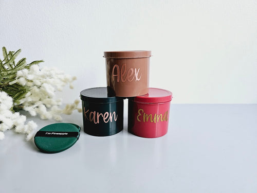 tear drop shaped make-up sponges in coffee, strawberry and forest green, Housed in a small plastic personalised tub of a matching colour.