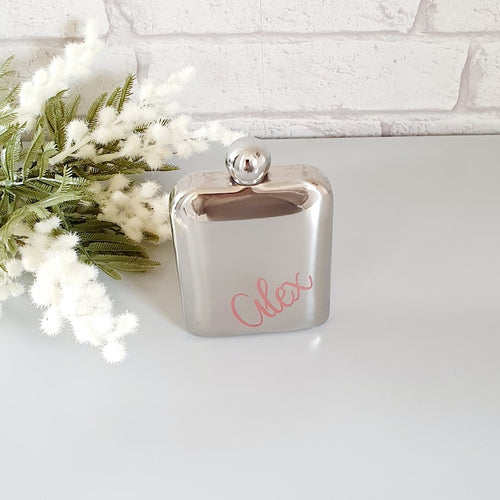 stainless steel rectangular hip flask with round lid. Personalised in the bottom right corner with a name of your choice. 